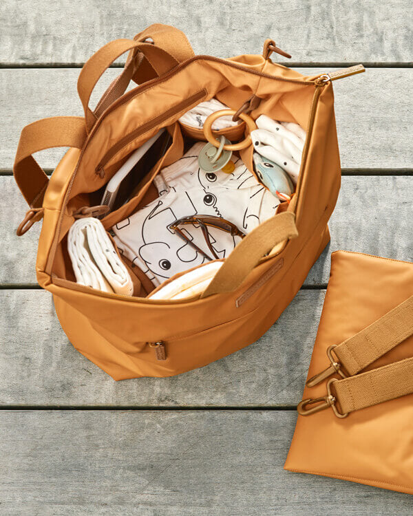 Weather- and waterproff changing bag from Done by Deer in mustard