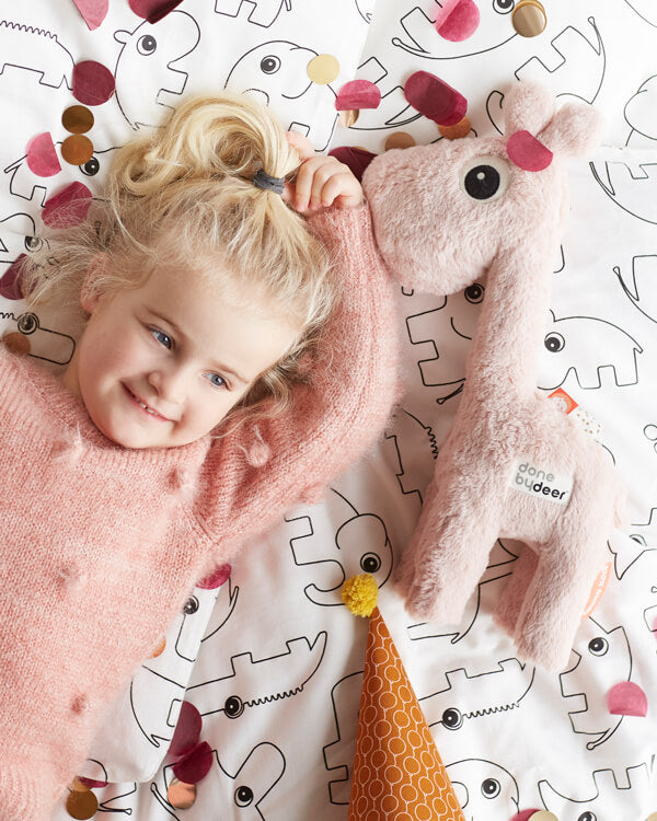 Little girl and Deer Raffi on Done by Deer bedlinen print with Deer friends