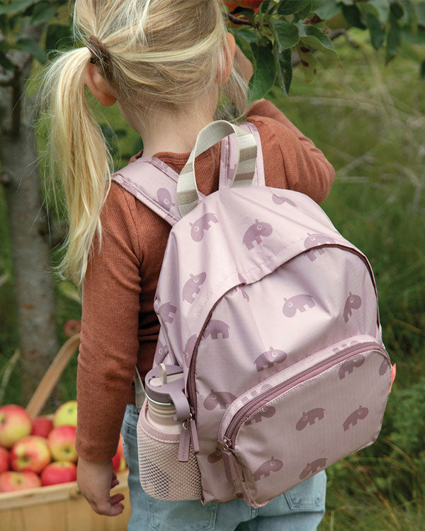 Girl with a backpack - ready for starting kindergarten