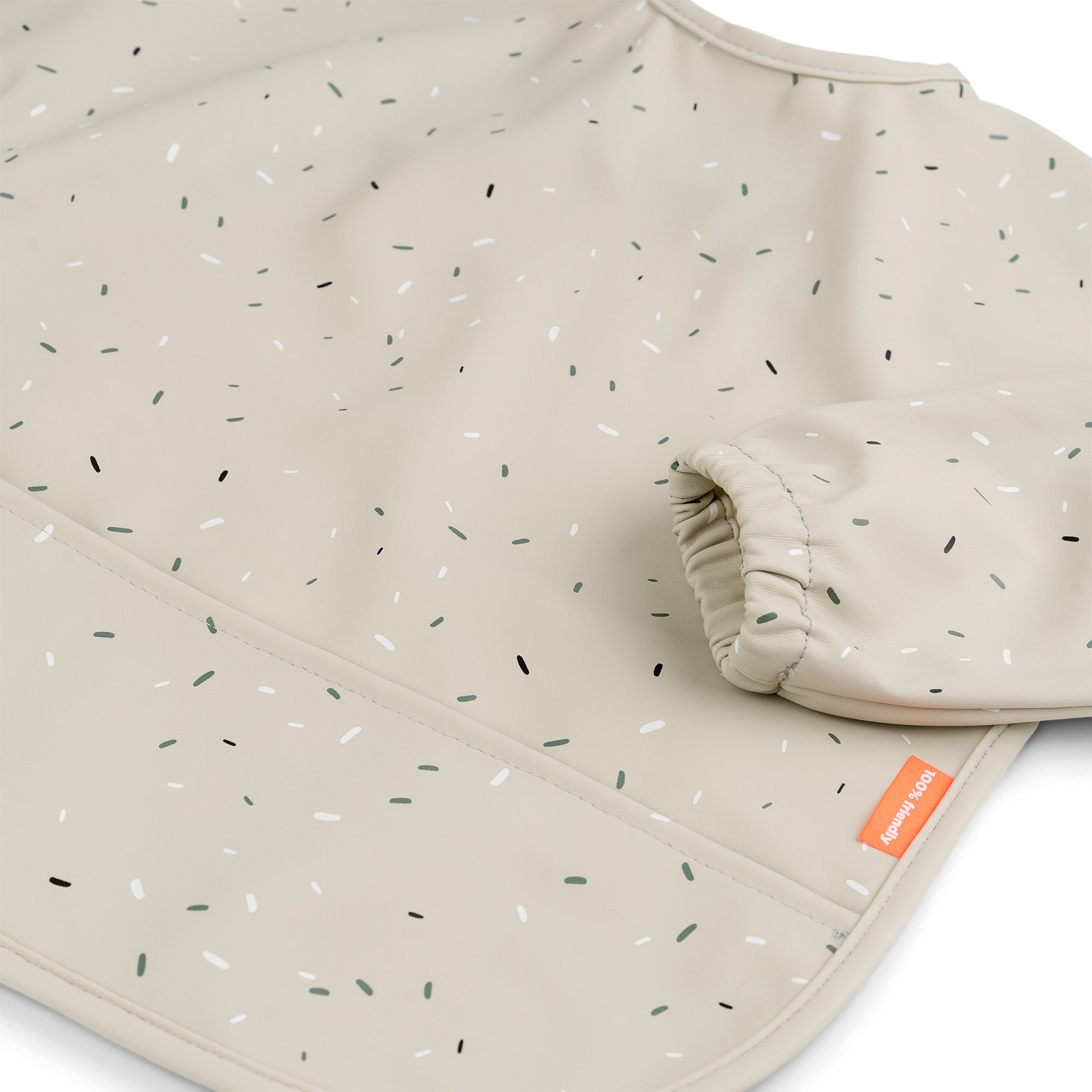 Sleeved pocket bib - Confetti - Sand - Detail