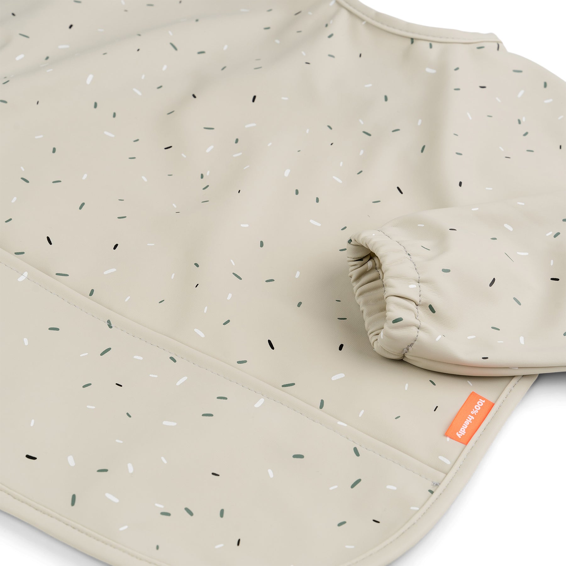 Sleeved pocket bib - Confetti - Sand - Detail